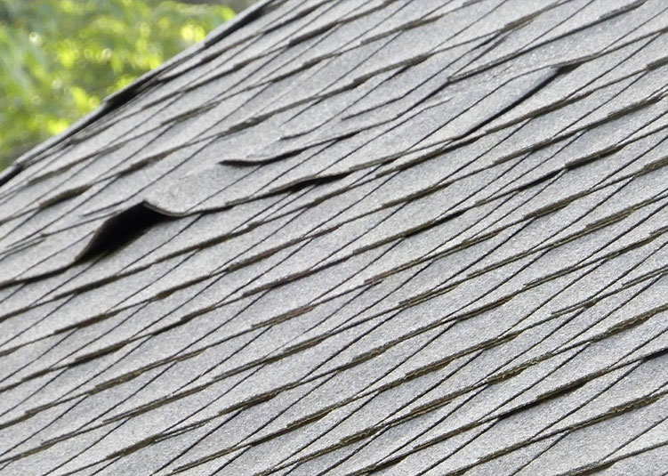 Wind Damage Roof Repair in Laurel