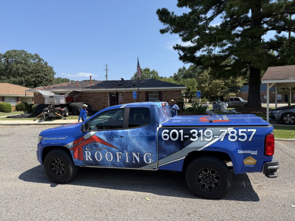 Cox Truck in front of FieldCrest Apartment Complex, a government job we completed.